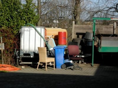 abandoned-chairs-containers-yard_1048944-26661611