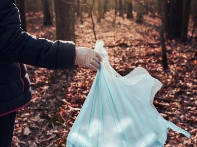 volunteer-picking-plastic-waste-bags-concept-plastic-pollution-too-many-plastic-waste_1048944-16368587